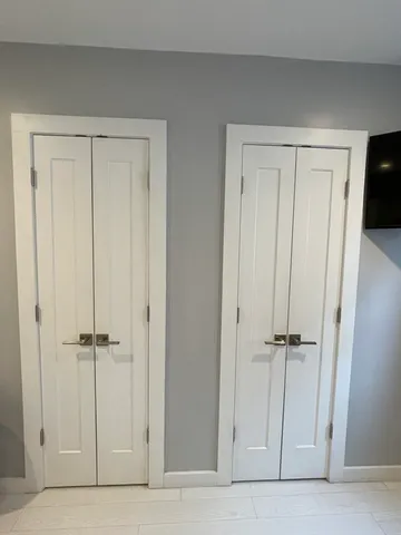 a bathroom with a shower and a tub