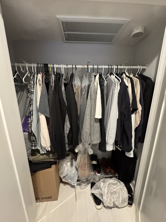 469 Massachusetts Avenue, Unit 1 Boston, MA 02118 - Photo 24 of 33 a view of walk in closet with clothes