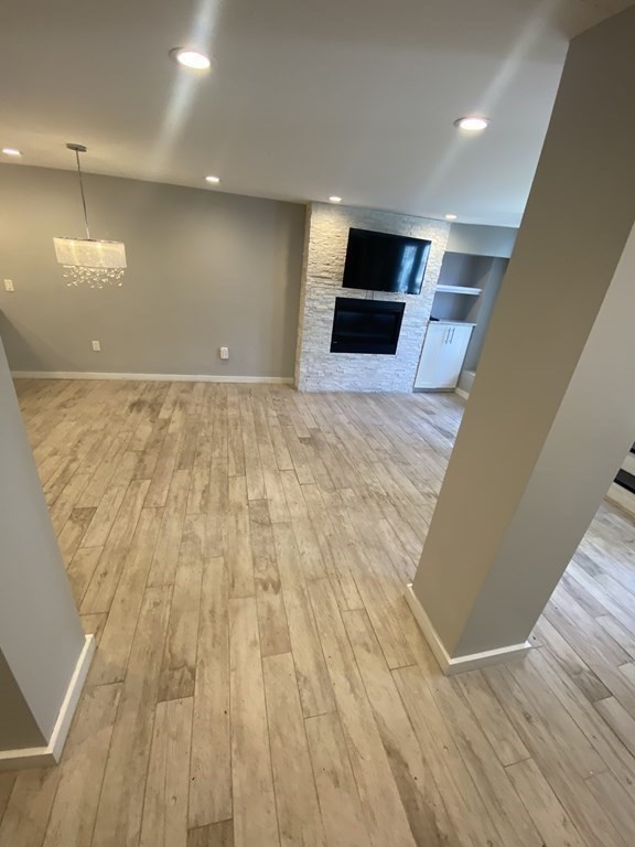 469 Massachusetts Avenue, Unit 1 Boston, MA 02118 - Photo 29 of 33 a view of empty room with wooden floor