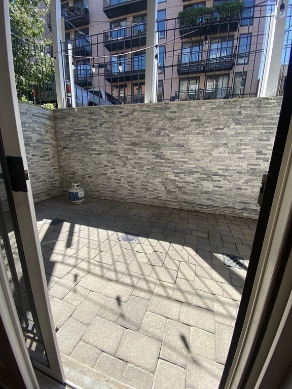 469 Massachusetts Avenue, Unit 1 Boston, MA 02118 - Photo 8 of 33 a view of swimming pool with a porch