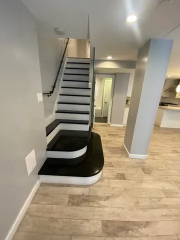 a bedroom with bed and window