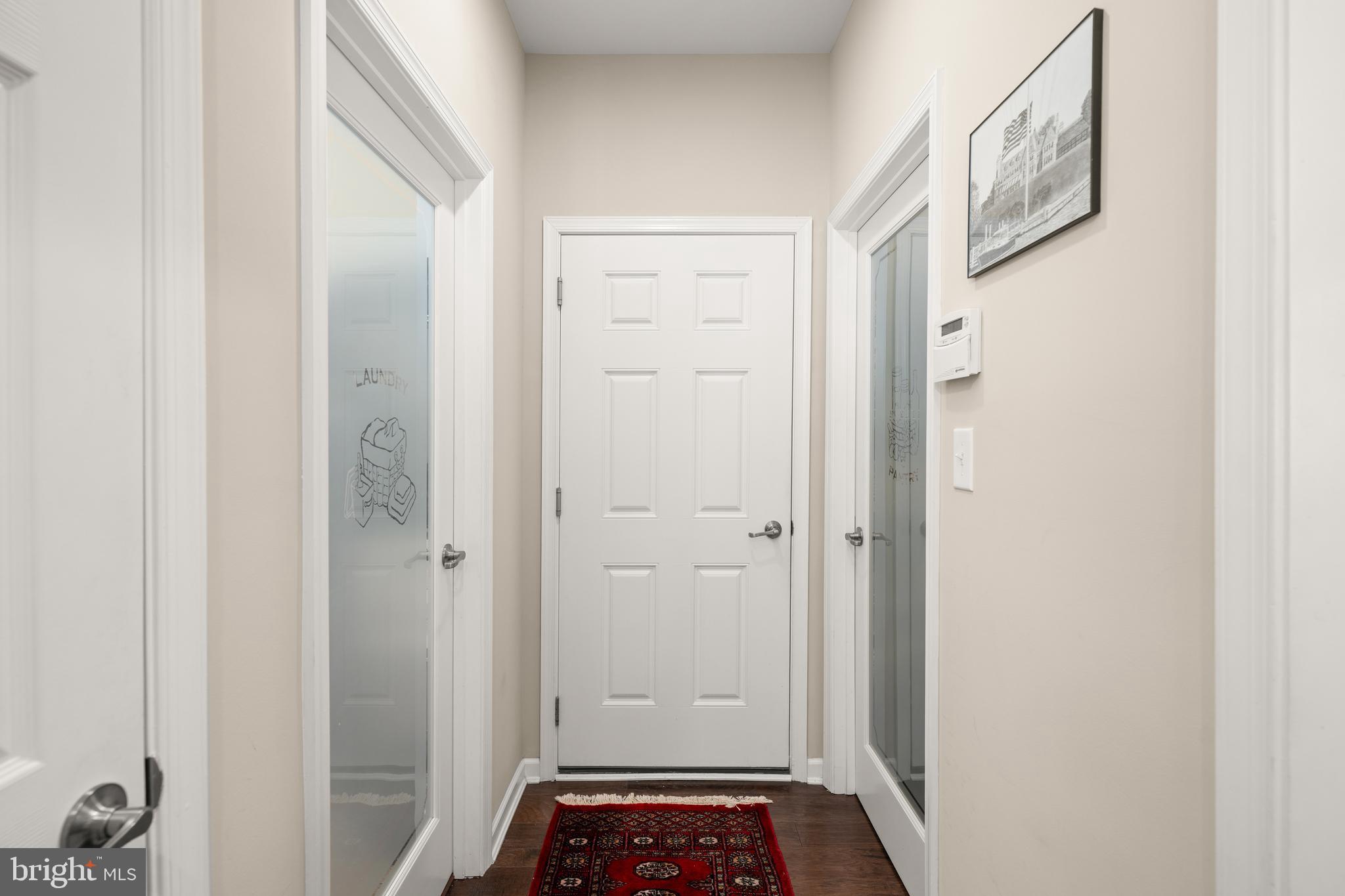 16624 Shoal Road Lewes, DE 19958 - Photo 21 of 67 Hallway to laundry room, pantry, & garage
