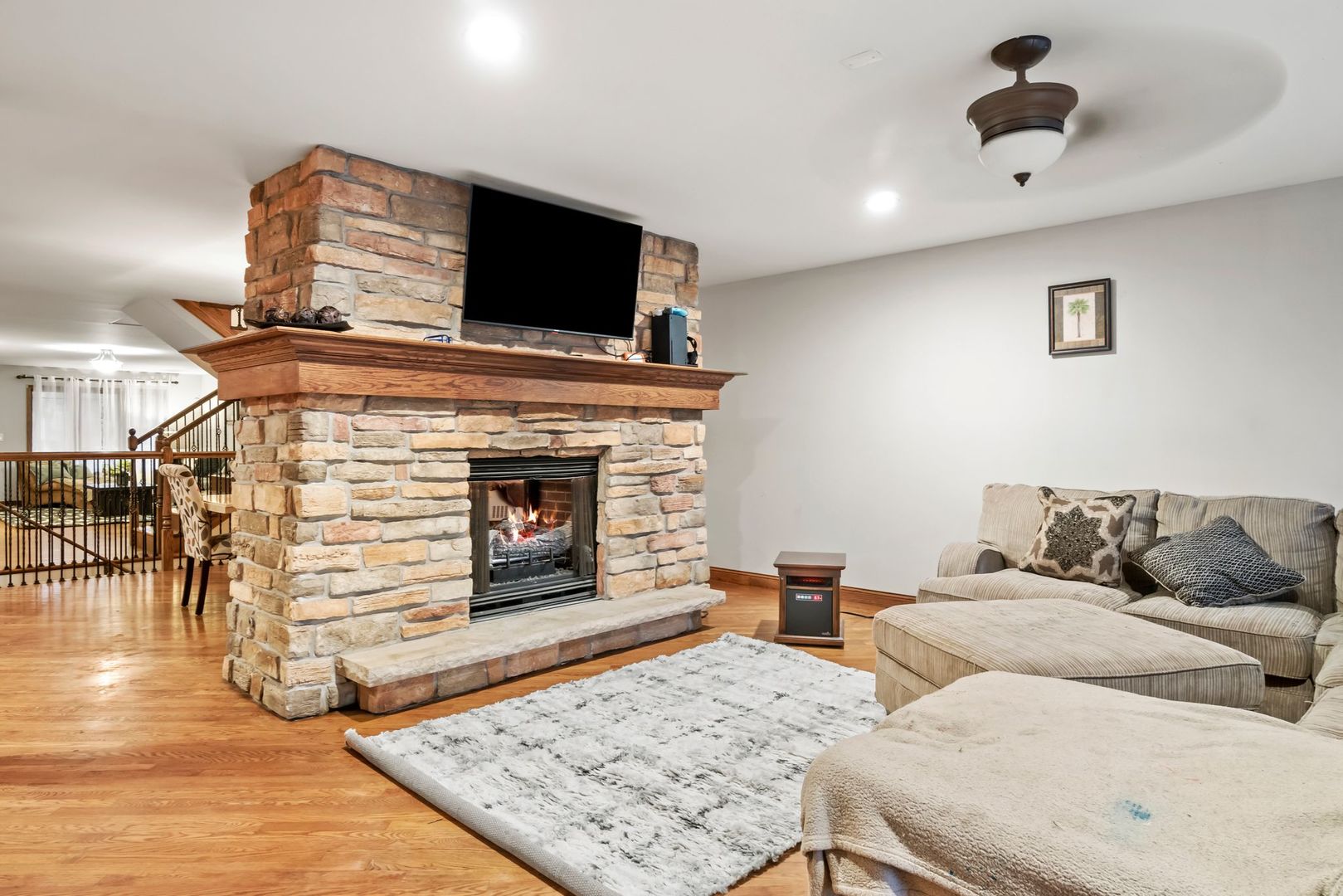 181 Herrick Road Riverside, IL 60546 - Photo 11 of 27 a living room with furniture and a fireplace
