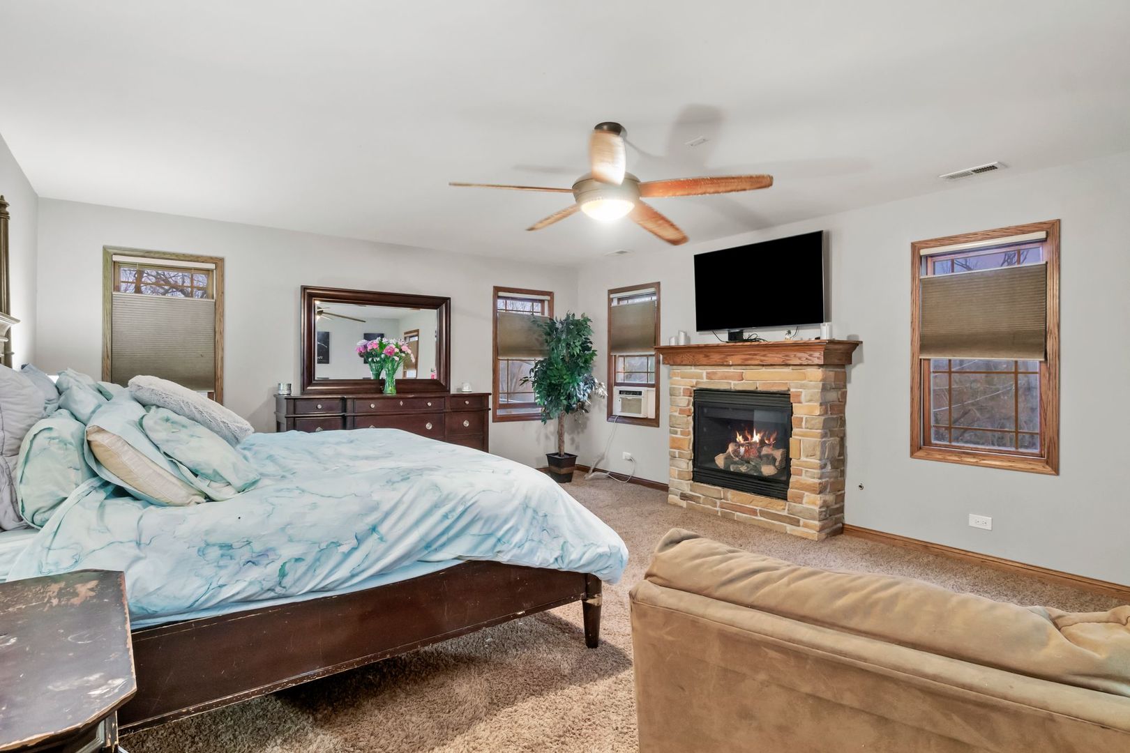 181 Herrick Road Riverside, IL 60546 - Photo 13 of 27 a bedroom with a bed and a flat screen tv