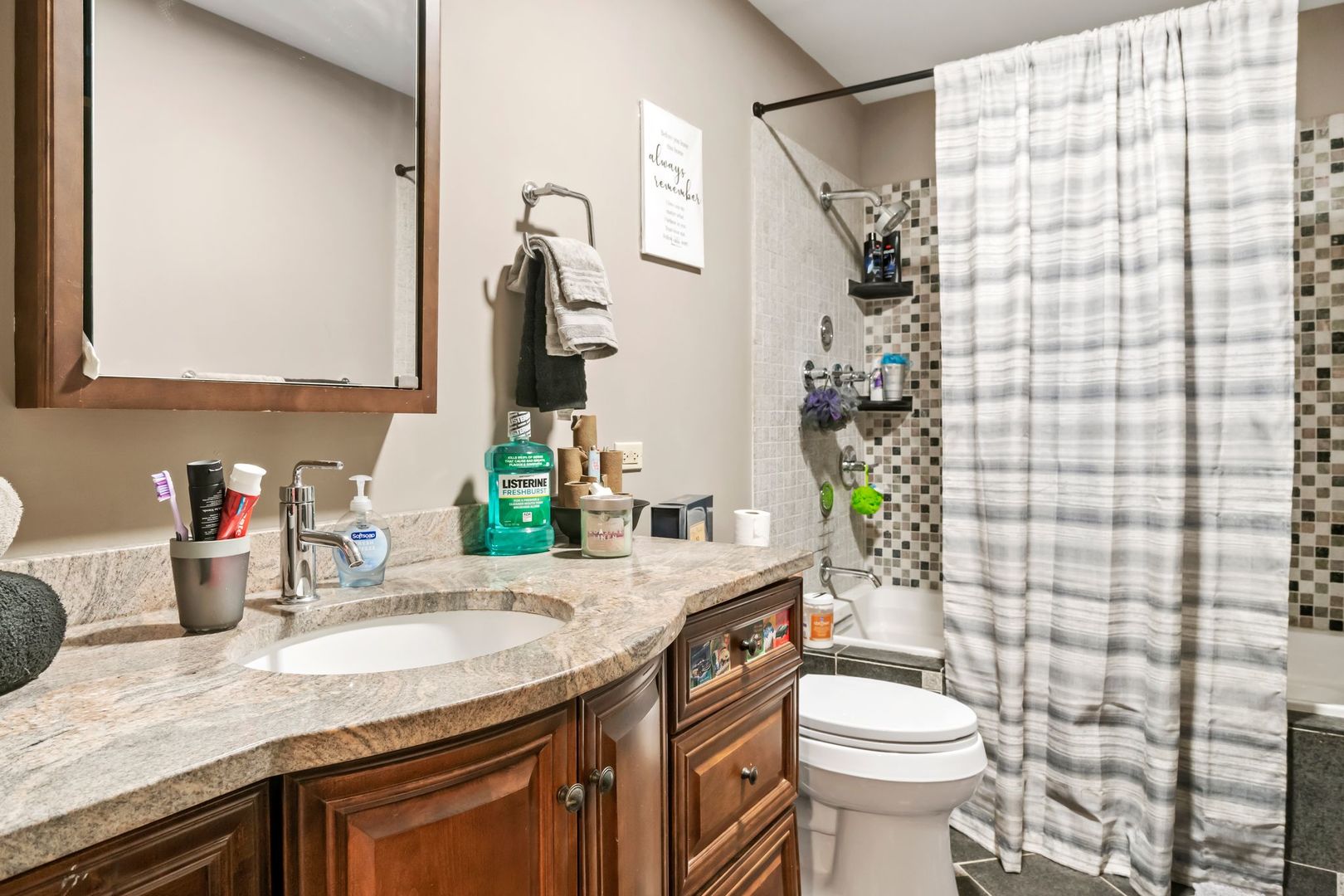 181 Herrick Road Riverside, IL 60546 - Photo 14 of 27 a bathroom with a granite countertop sink toilet and shower