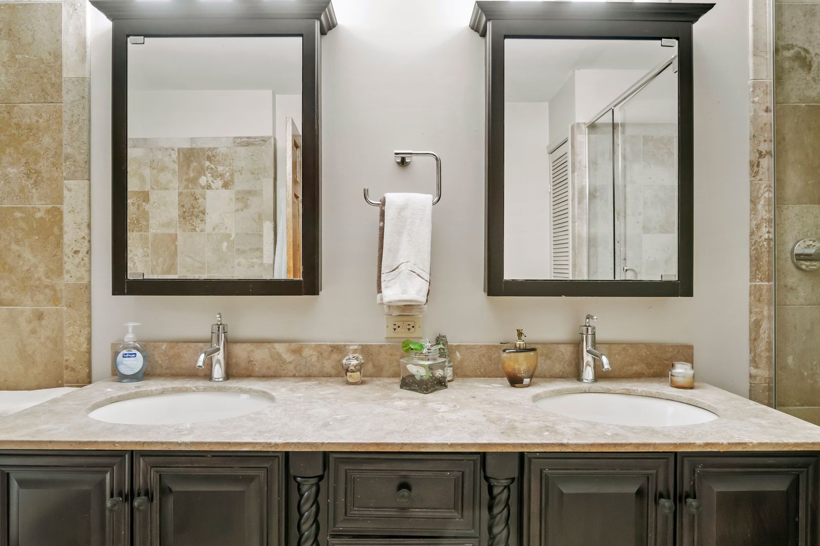 181 Herrick Road Riverside, IL 60546 - Photo 15 of 27 a bathroom with a granite countertop sink two mirror and a