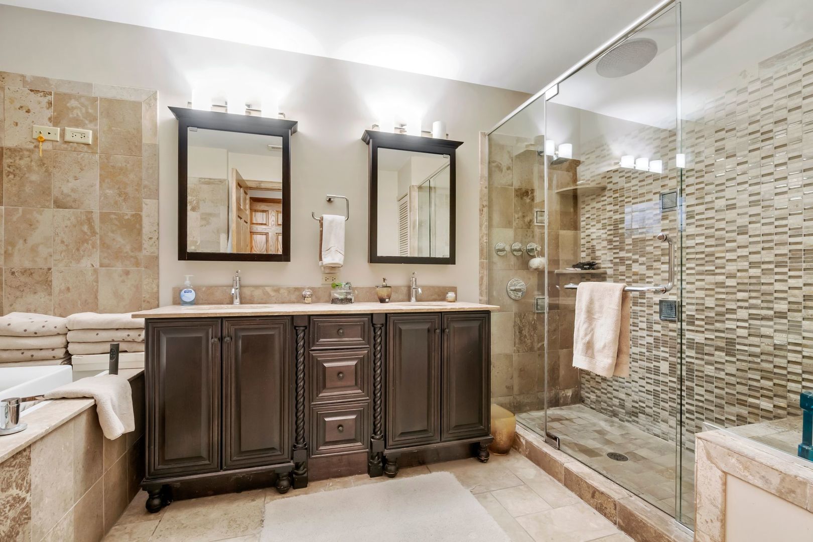 181 Herrick Road Riverside, IL 60546 - Photo 17 of 27 a bathroom with a granite countertop sink mirror and shower