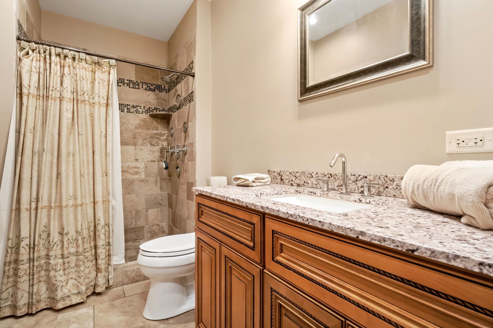 181 Herrick Road Riverside, IL 60546 - Photo 19 of 27 a bathroom with a granite countertop sink toilet and shower