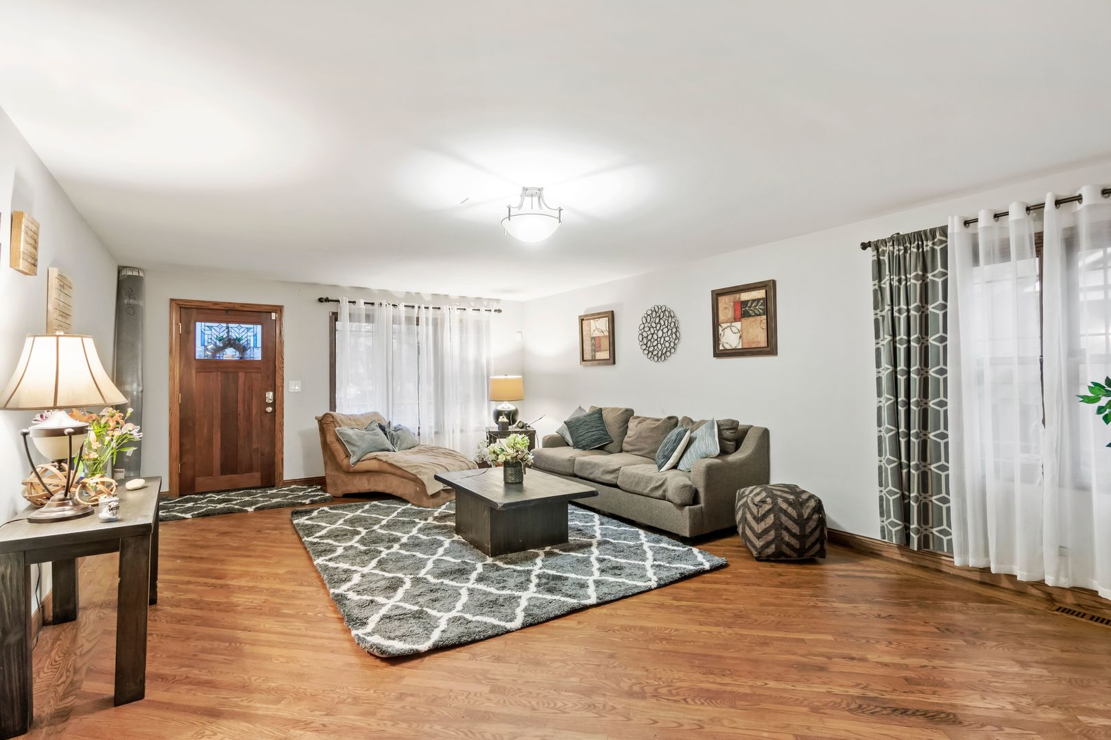 181 Herrick Road Riverside, IL 60546 - Photo 5 of 27 a living room with furniture and a wooden floor