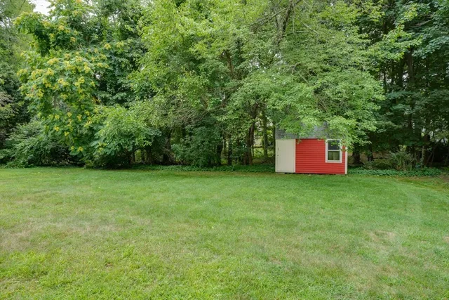 a view of a yard with a barn