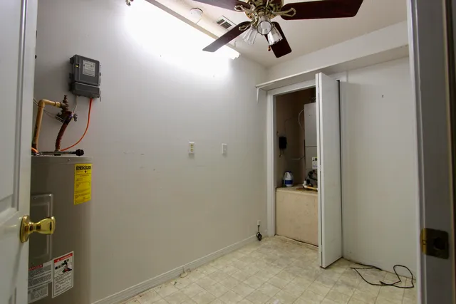 a house with trees in the background