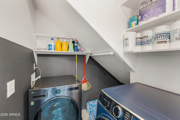 a utility room with dryer and washer
