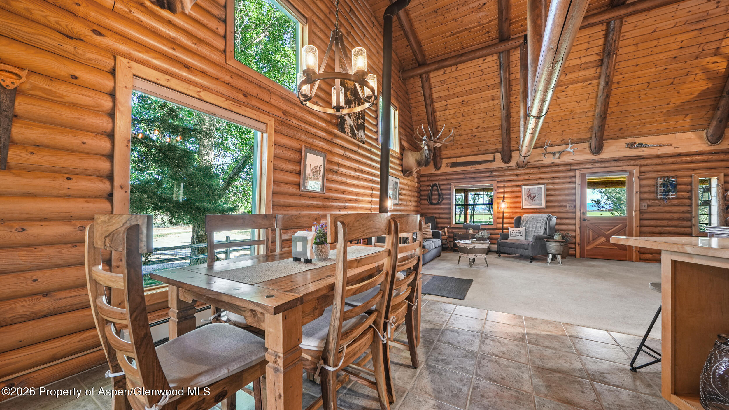 1355 N Road Loma, CO 81524 - Photo 18 of 51 a view of a patio with a table and chairs and couches