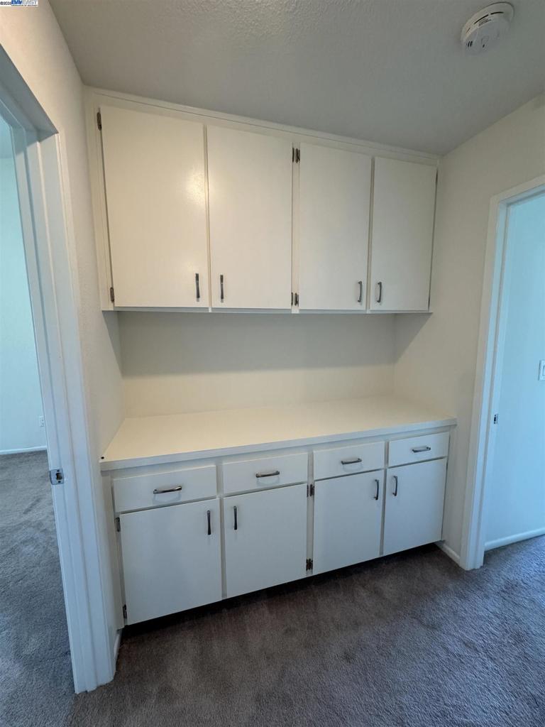 8145 Mountain View Drive Pleasanton, CA 94588 - Photo 13 of 19 a view of cabinets and utility room