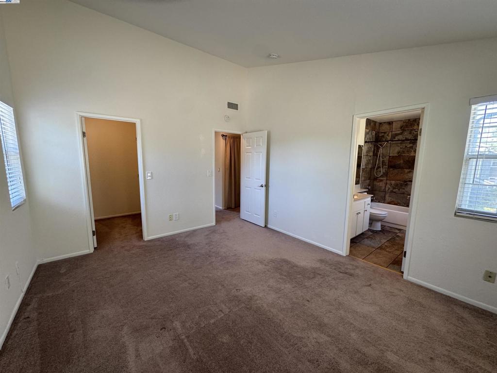 8145 Mountain View Drive Pleasanton, CA 94588 - Photo 15 of 19 a view of a room with closet and windows