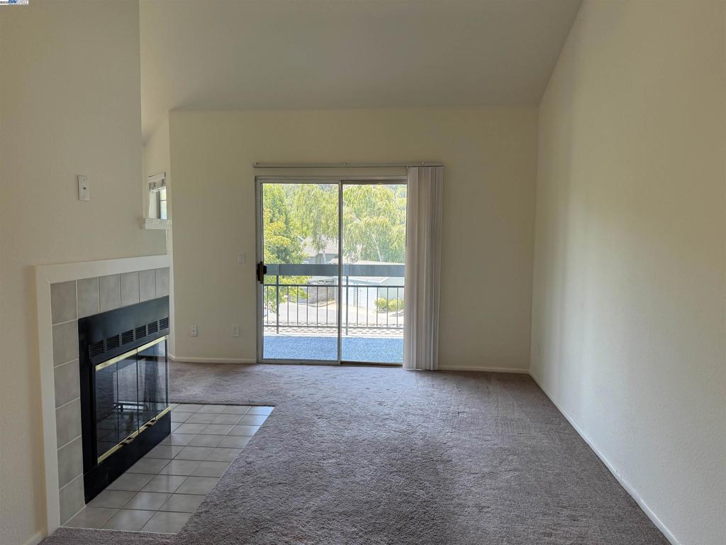 8145 Mountain View Drive Pleasanton, CA 94588 - Photo 3 of 19 a view of an empty room with a fireplace