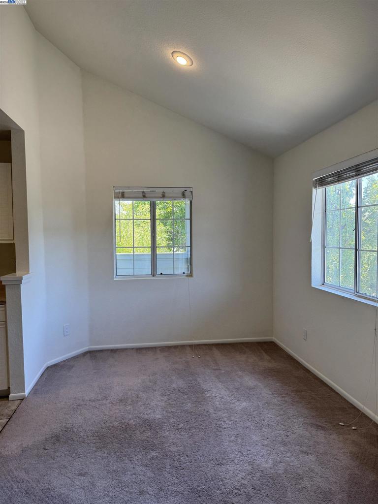 8145 Mountain View Drive Pleasanton, CA 94588 - Photo 4 of 19 an empty room with windows