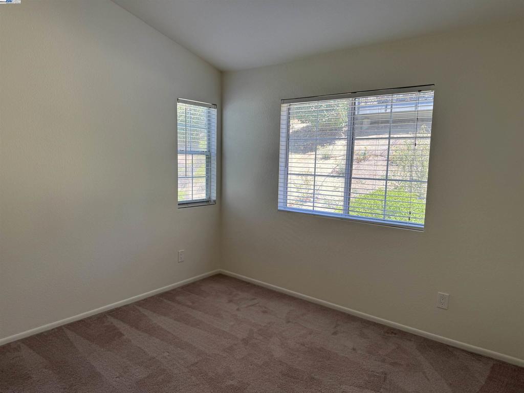 8145 Mountain View Drive Pleasanton, CA 94588 - Photo 8 of 19 an empty room with a window