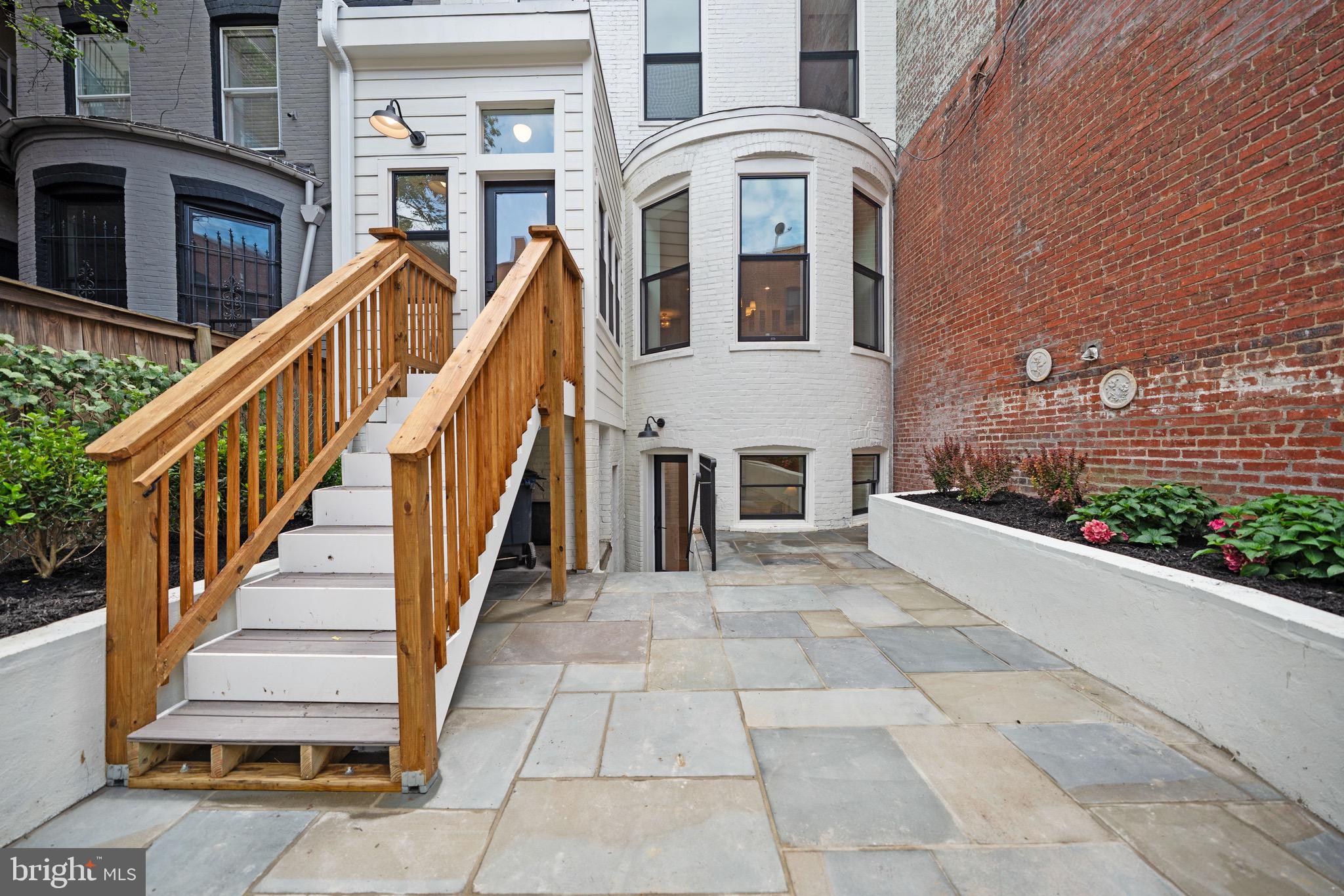 1834 16th Street Northwest Washington, DC 20009 - Photo 13 of 52 A flagstone patio to take the party outside