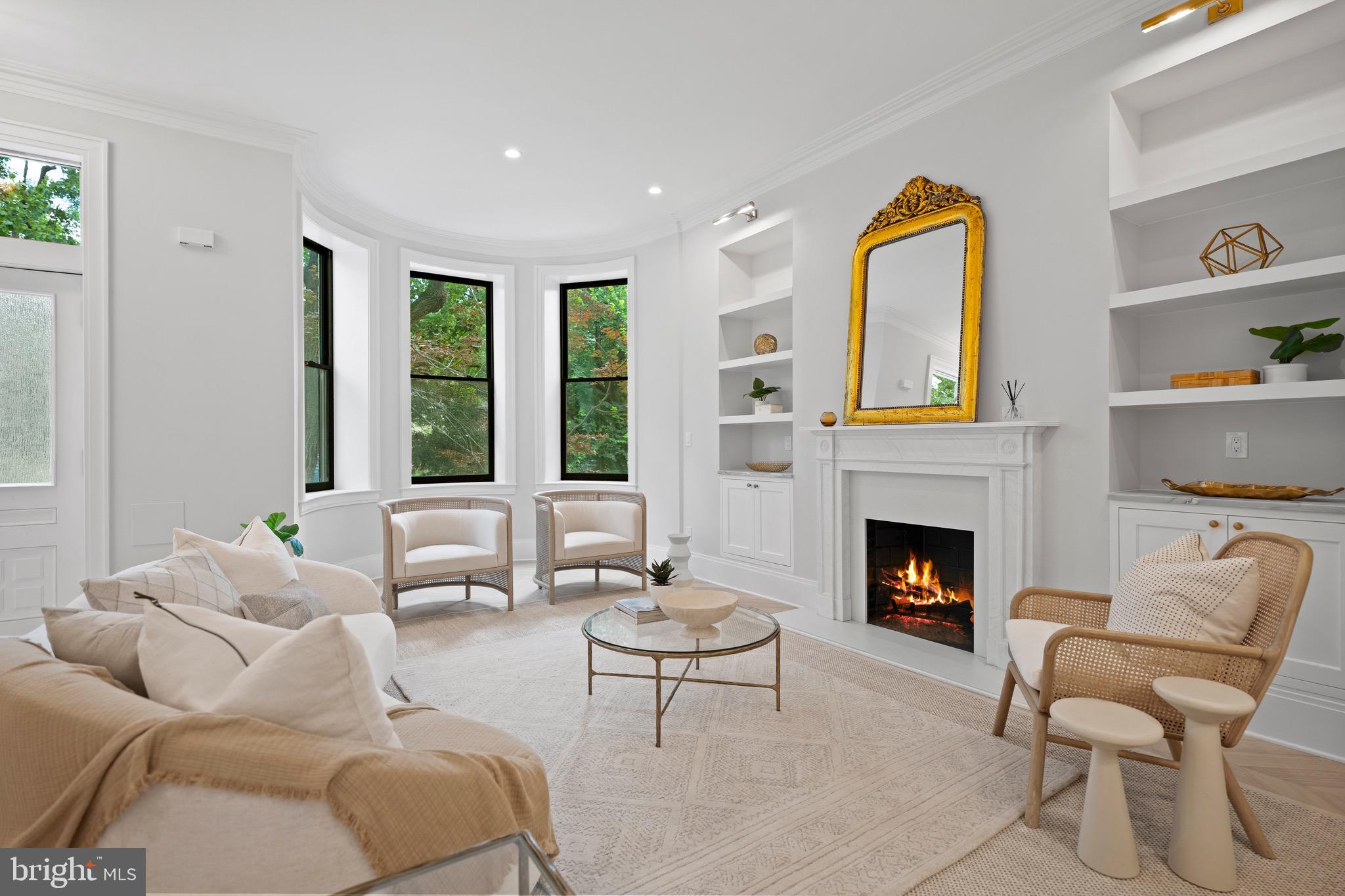 1834 16th Street Northwest Washington, DC 20009 - Photo 2 of 52 An incredible living room with wood fireplace