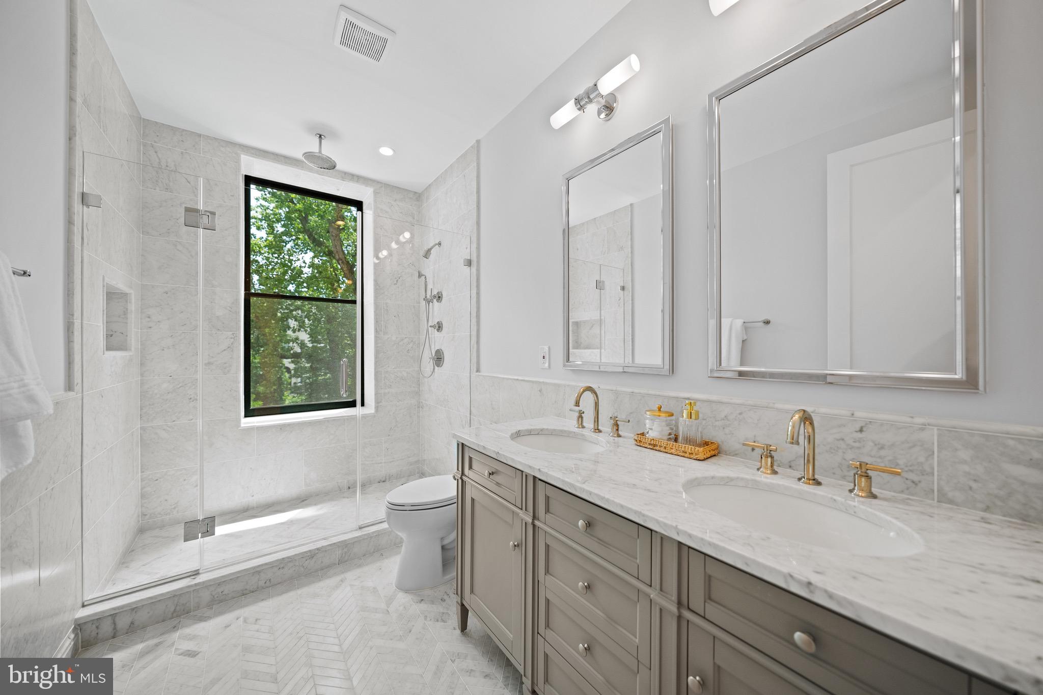 1834 16th Street Northwest Washington, DC 20009 - Photo 21 of 52 The primary bathroom, flooded with light