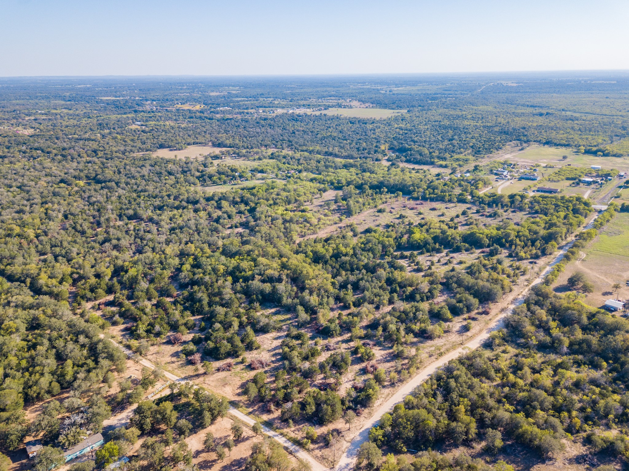 0 Hidden Oak Road Dale, TX 78616 - Photo 2 of 4 an aerial view of residential building and green space
