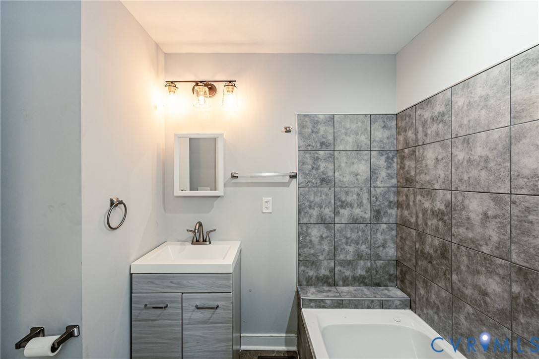 2015 Fordson Road Richmond, VA 23229 - Photo 25 of 48 Full bathroom featuring a single vanity with stora