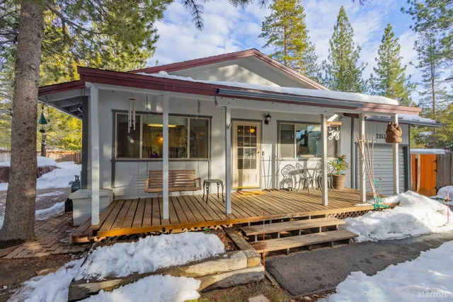 a backyard of a house with seating space