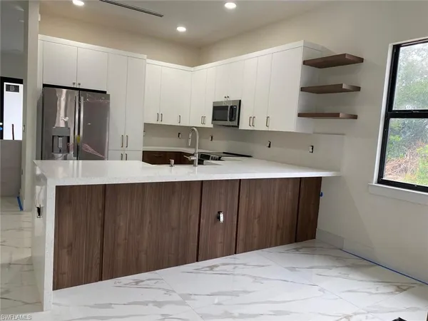 $593,000 | 823 47th Avenue Northeast, Naples, FL 34120