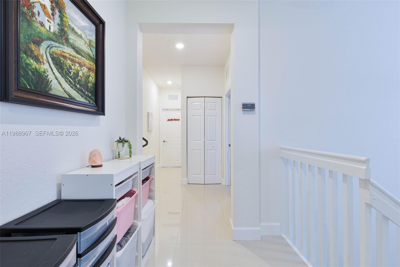 9015 Northwest 183rd Street Hialeah, FL 33018 - Photo 19 of 45 a bathroom with a sink vanity and a mirror