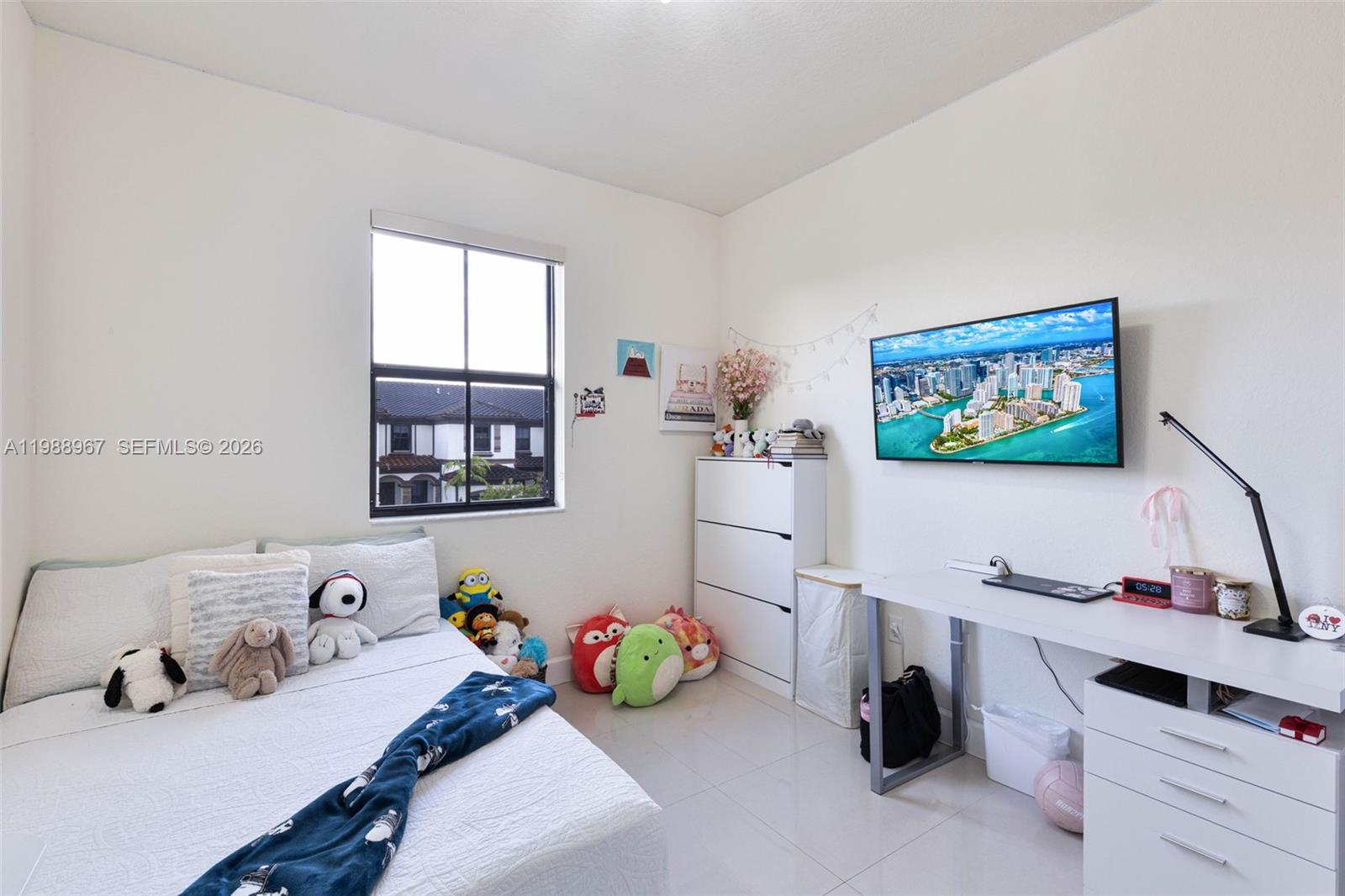 9015 Northwest 183rd Street Hialeah, FL 33018 - Photo 24 of 45 a view of a workspace with furniture and toys