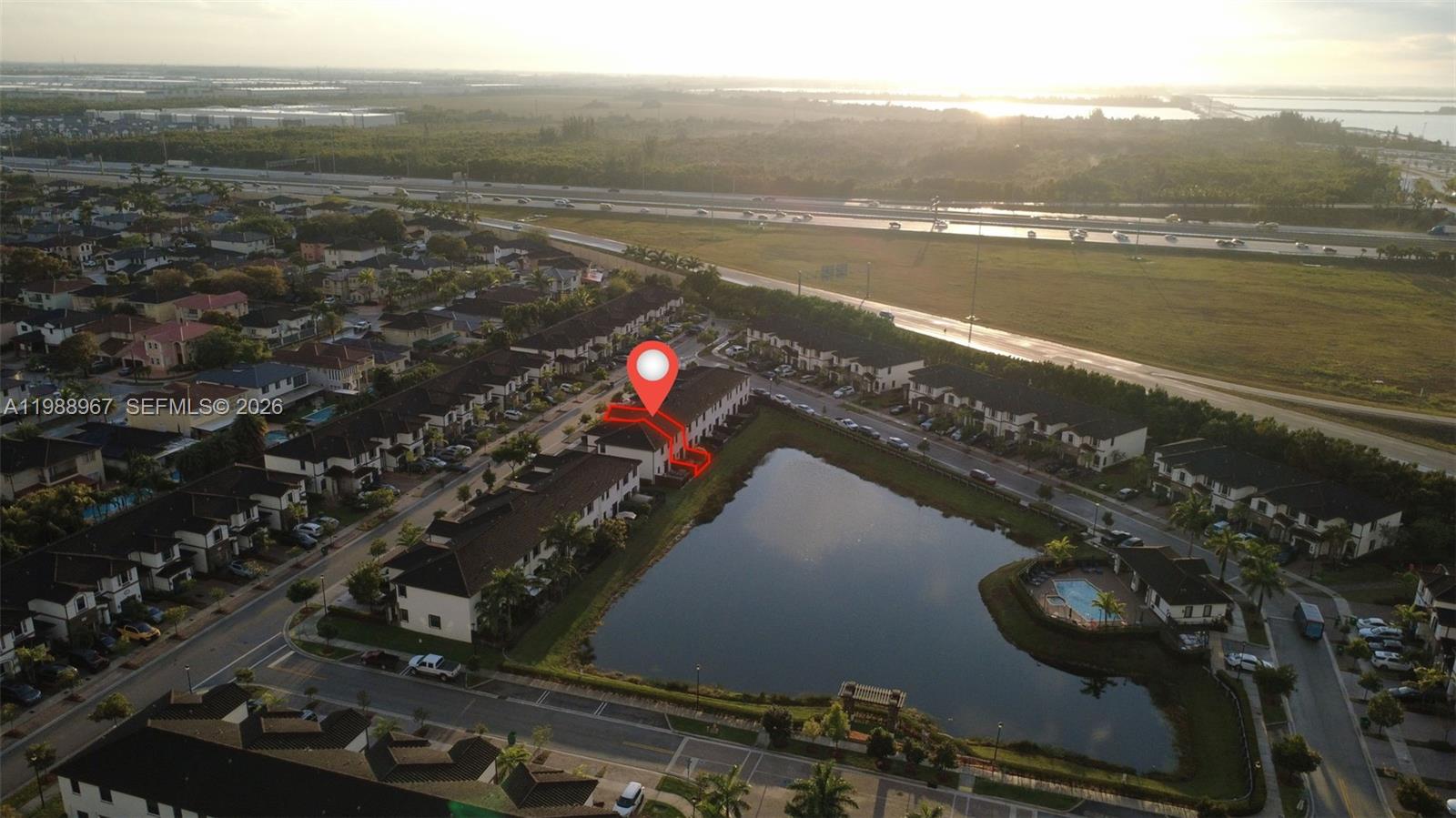 9015 Northwest 183rd Street Hialeah, FL 33018 - Photo 39 of 45 a view of a lake with a mountain
