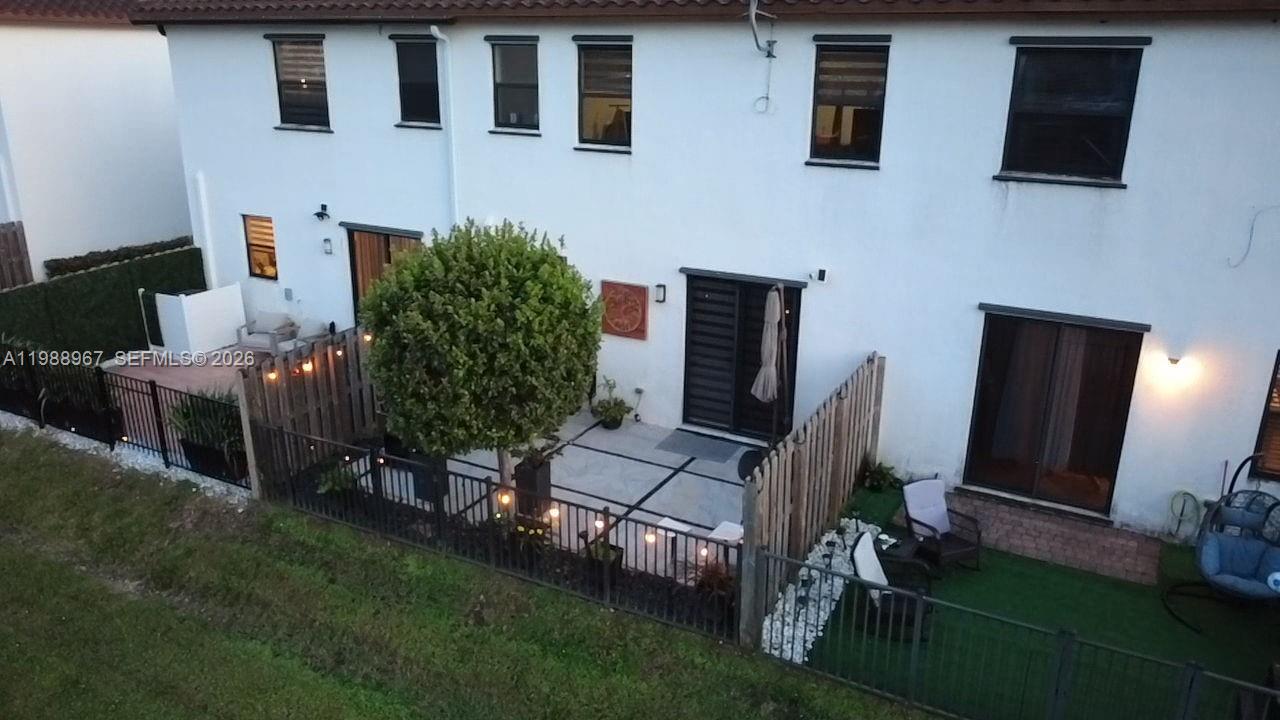 9015 Northwest 183rd Street Hialeah, FL 33018 - Photo 41 of 45 a building outdoor space with patio furniture