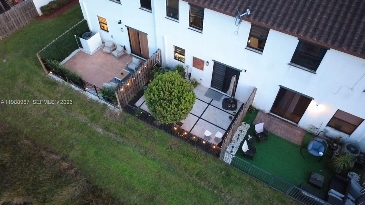 9015 Northwest 183rd Street Hialeah, FL 33018 - Photo 43 of 45 an aerial view of house with yard