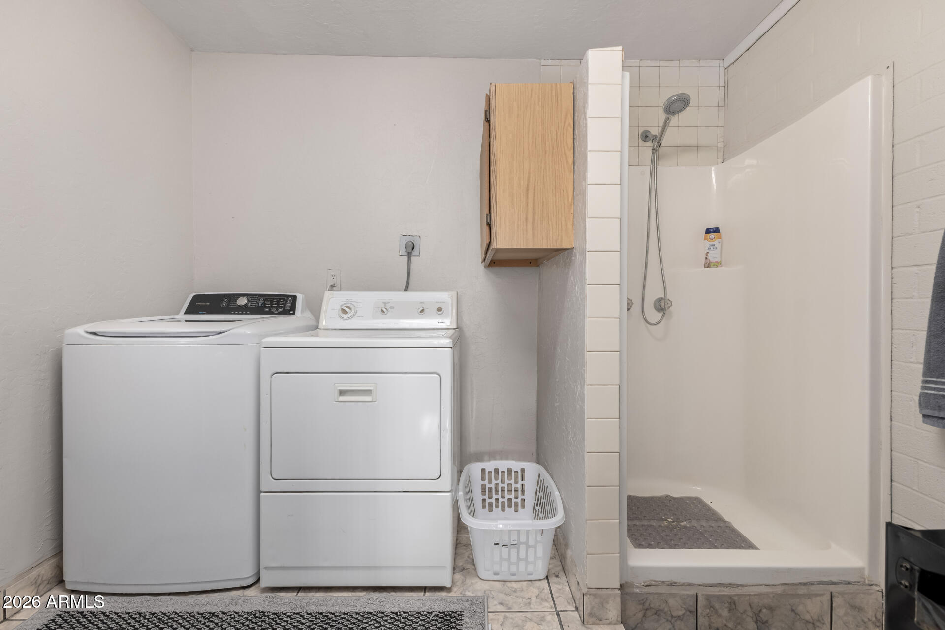 4032 West Nancy Lane Phoenix, AZ 85041 - Photo 23 of 29 a utility room with dryer and washer