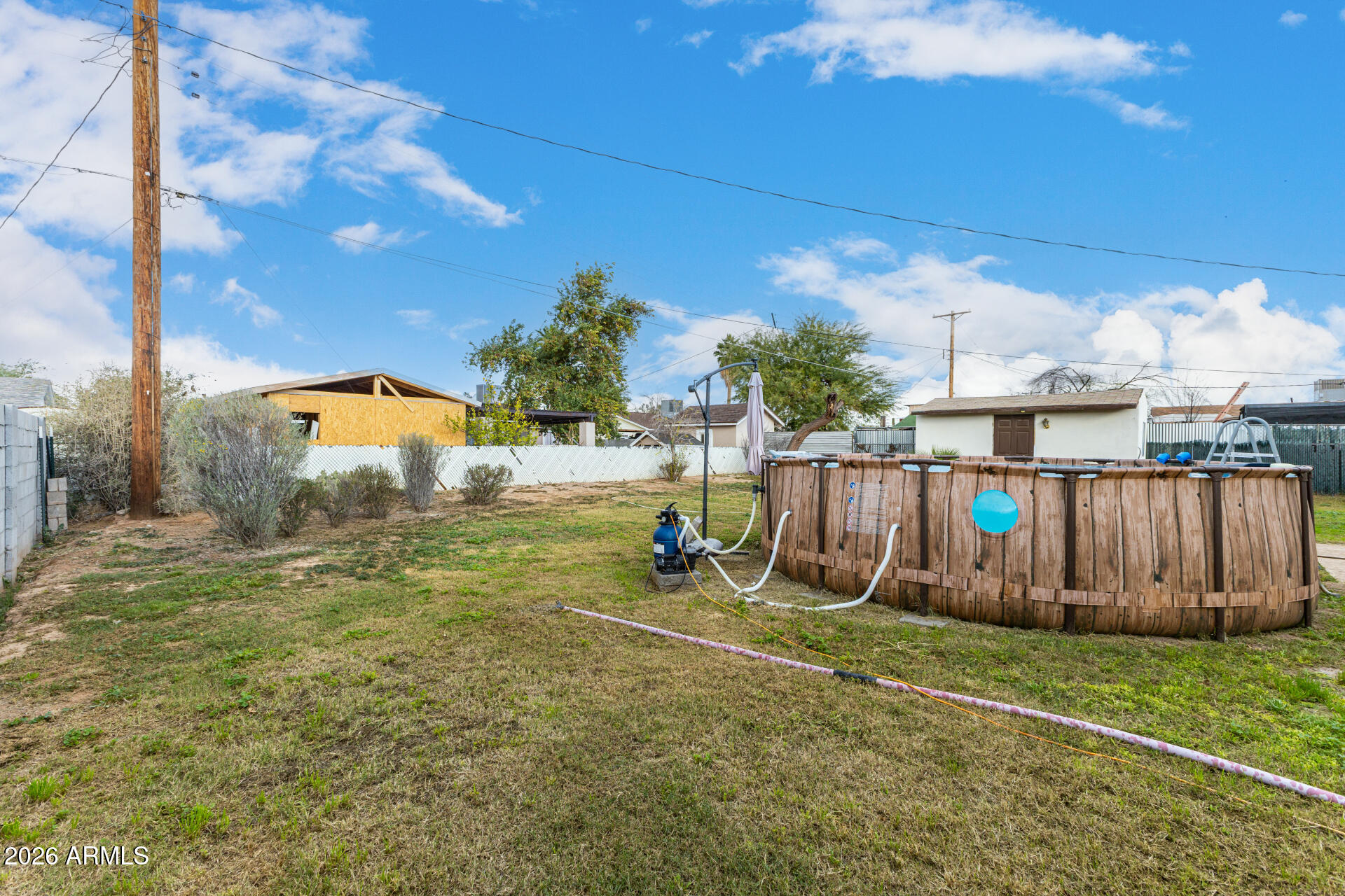 4032 West Nancy Lane Phoenix, AZ 85041 - Photo 24 of 29 a view of outdoor space with wooden fence