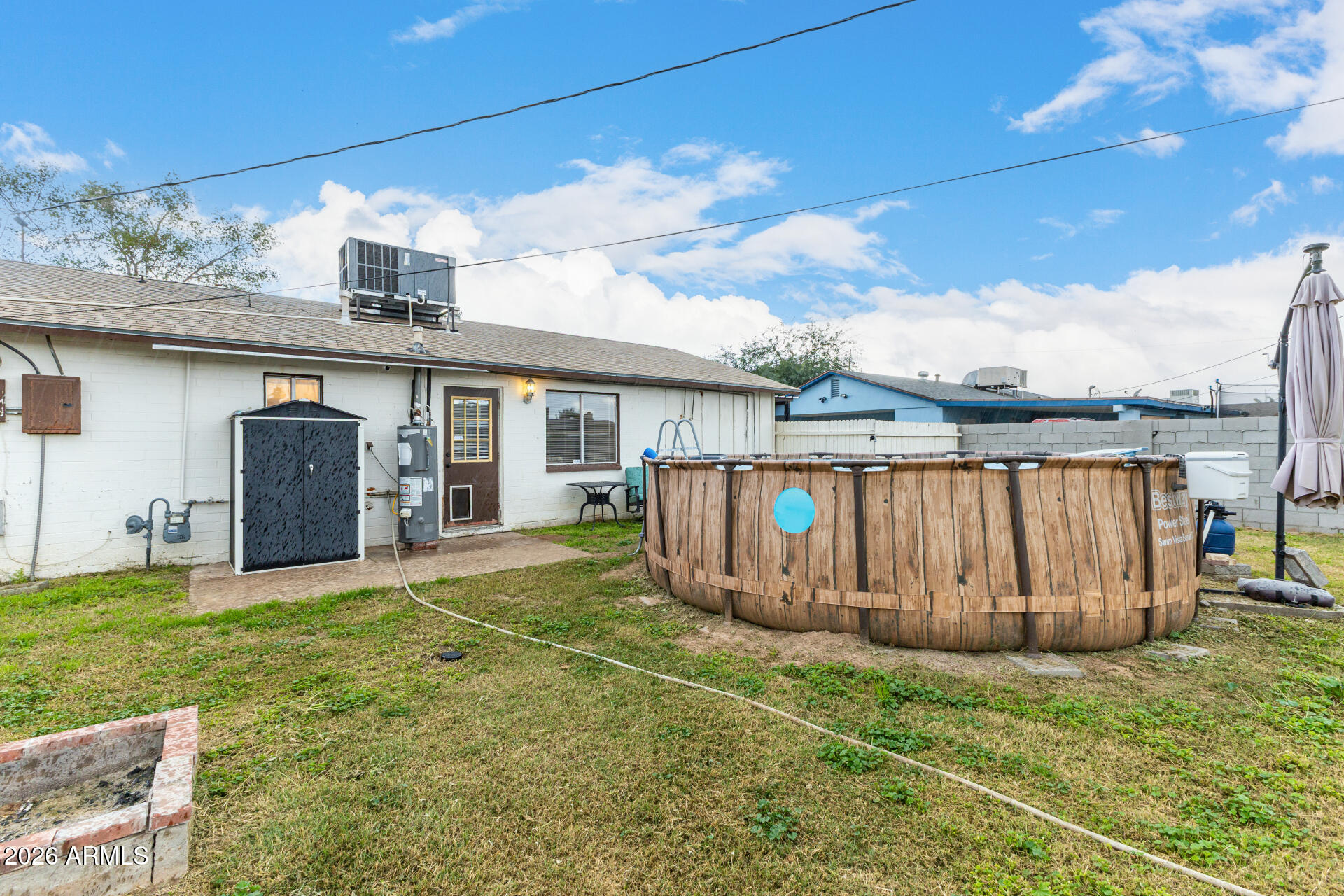 4032 West Nancy Lane Phoenix, AZ 85041 - Photo 29 of 29 a view of a house with backyard and sitting area