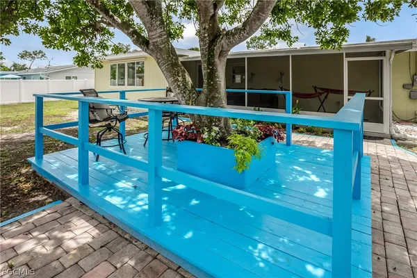 a view of house with outdoor seating
