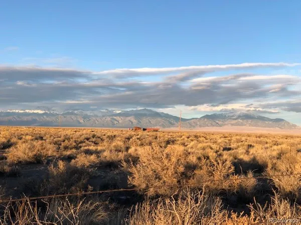 a view of city and green space