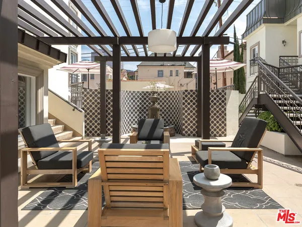 a outdoor space with patio lots of furniture