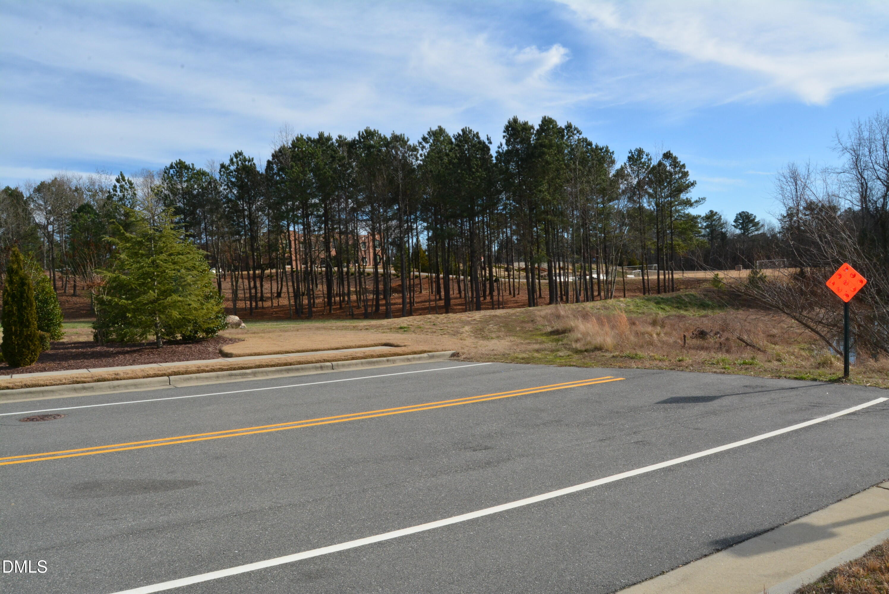 1200 Granite Fls Boulevard Rolesville, NC 27571 - Photo 11 of 13 a view of a building with a street
