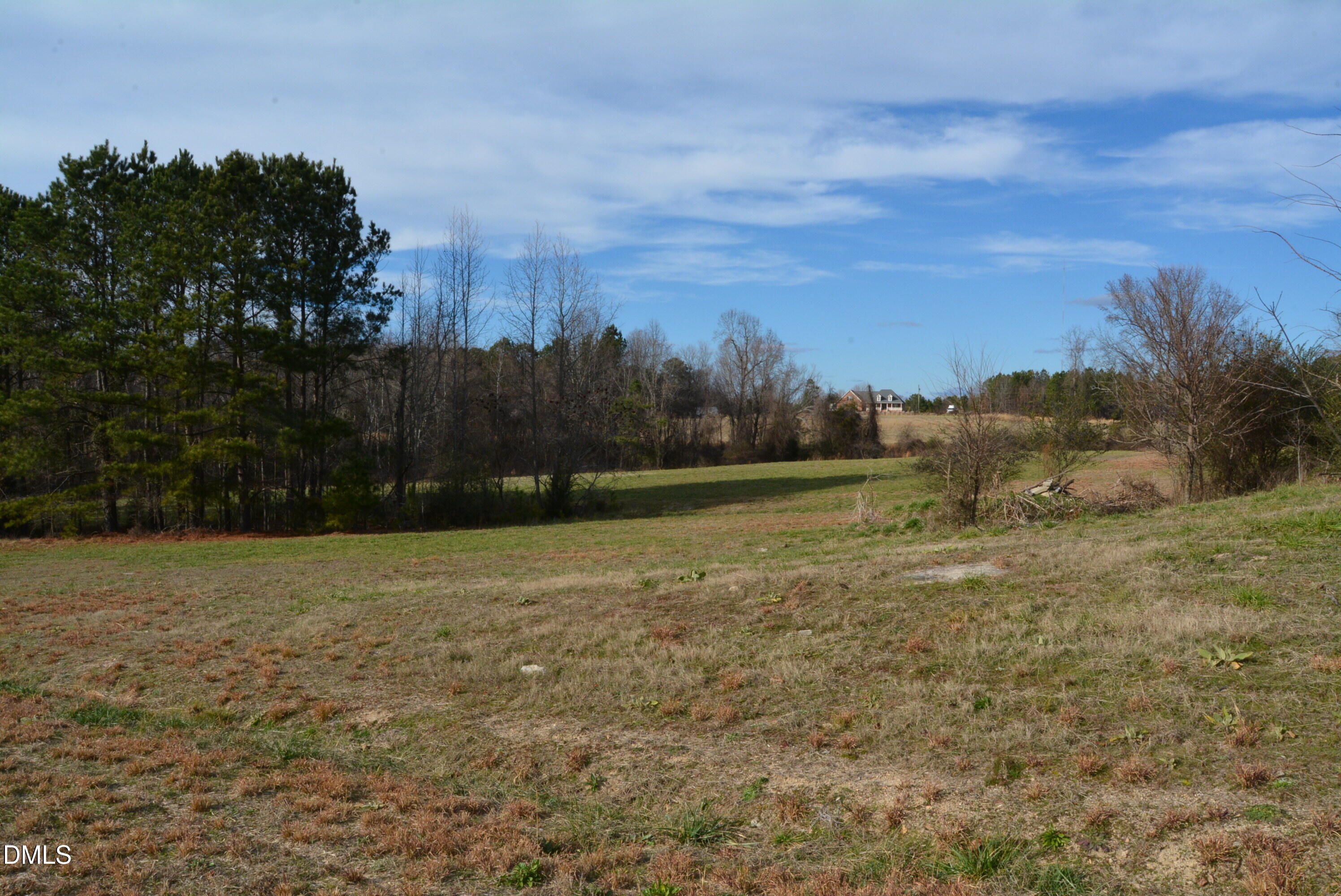 1200 Granite Fls Boulevard Rolesville, NC 27571 - Photo 6 of 13 a view of a field with trees in the background