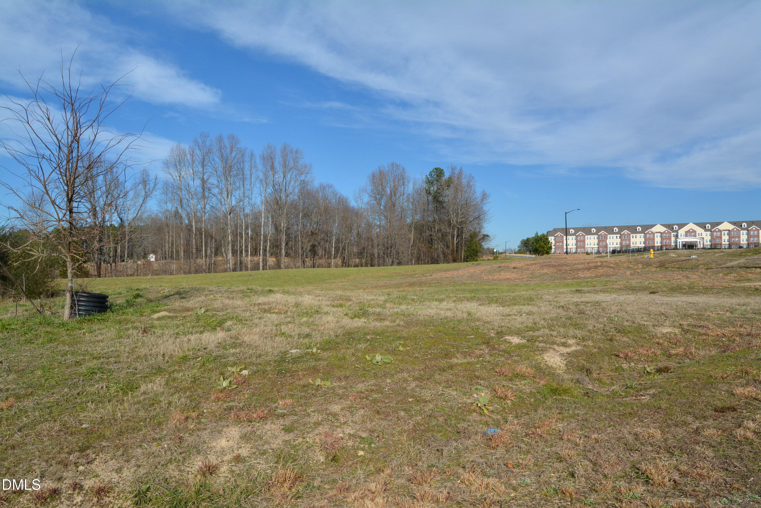 1200 Granite Fls Boulevard Rolesville, NC 27571 - Photo 7 of 13 a view of a field with trees in the background