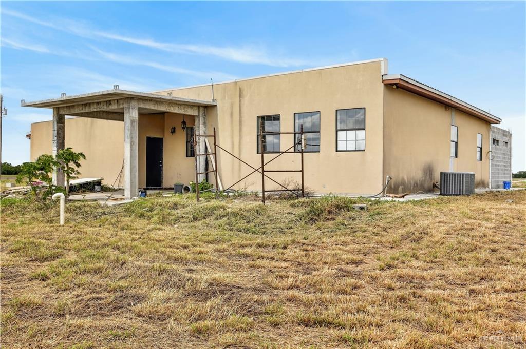 1424 North Sky Soldier Road Weslaco, TX 78596 - Photo 26 of 33 a view of house with backyard and space