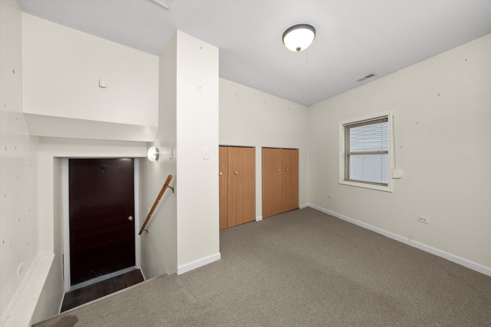 18057 Juneway Court Country Club Hills, IL 60478 - Photo 32 of 36 an empty room with closet and mirror