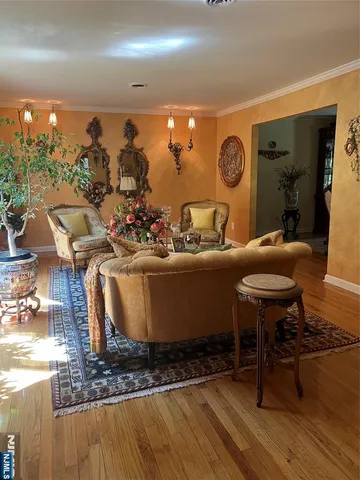 a view of a living room and dining room