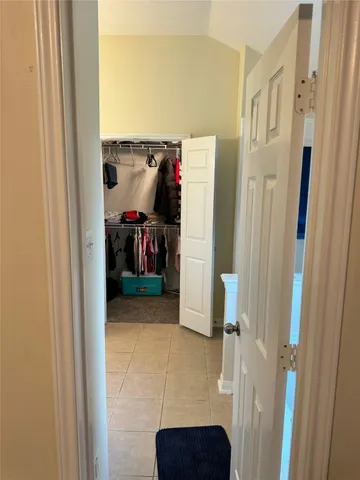 a bathroom with a sink double vanity and a mirror