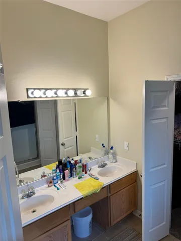 a view of a backyard with plants and outdoor seating