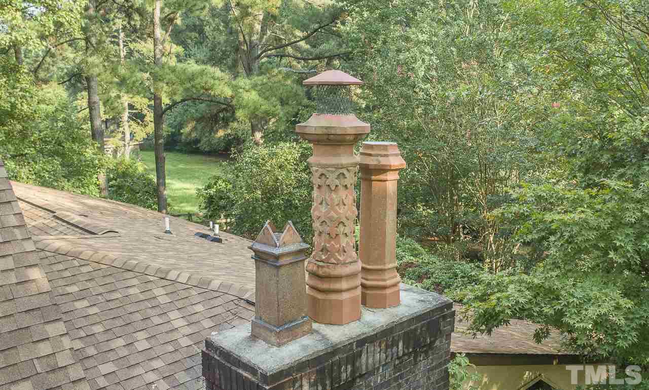 7625 Humie Olive Road Apex, NC 27502 - Photo 6 of 30 Unique clay pot chimneys
