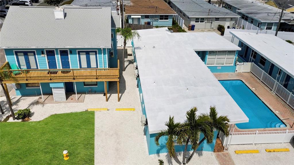 13343 Gulf Boulevard, Unit C9 Madeira Beach, FL 33708 - Photo 12 of 17 a view of a backyard with couches